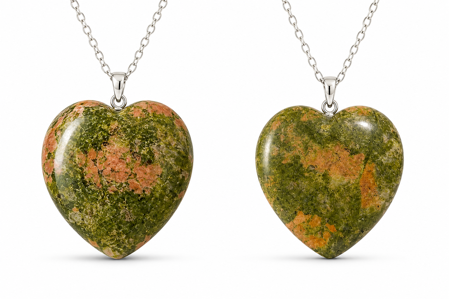Two heart-shaped gemstone pendants on silver chains, displayed side by side against a white background. The pendants feature a marbled pattern of green, orange, and brown.